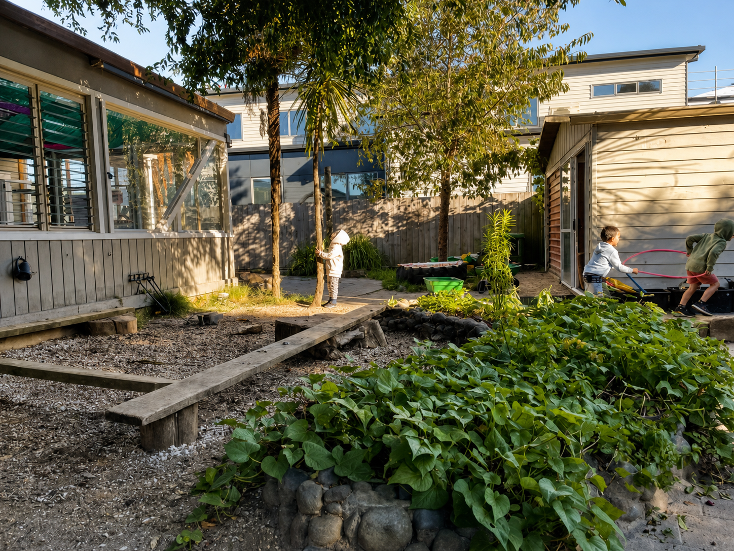 Children playing in the garden at Royal Oak Learning Centre