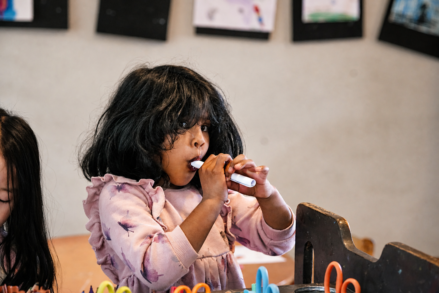 Child painting at Royal Oak Learning Centre