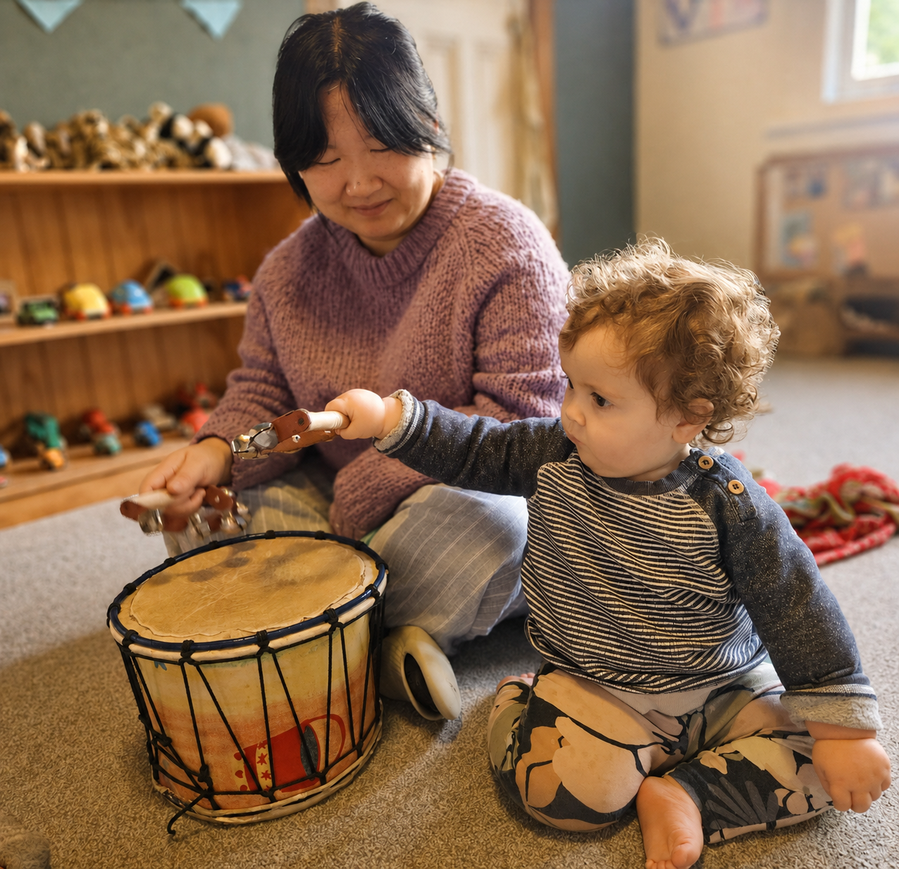 Teacher and baby exploring music together at Royal Oak